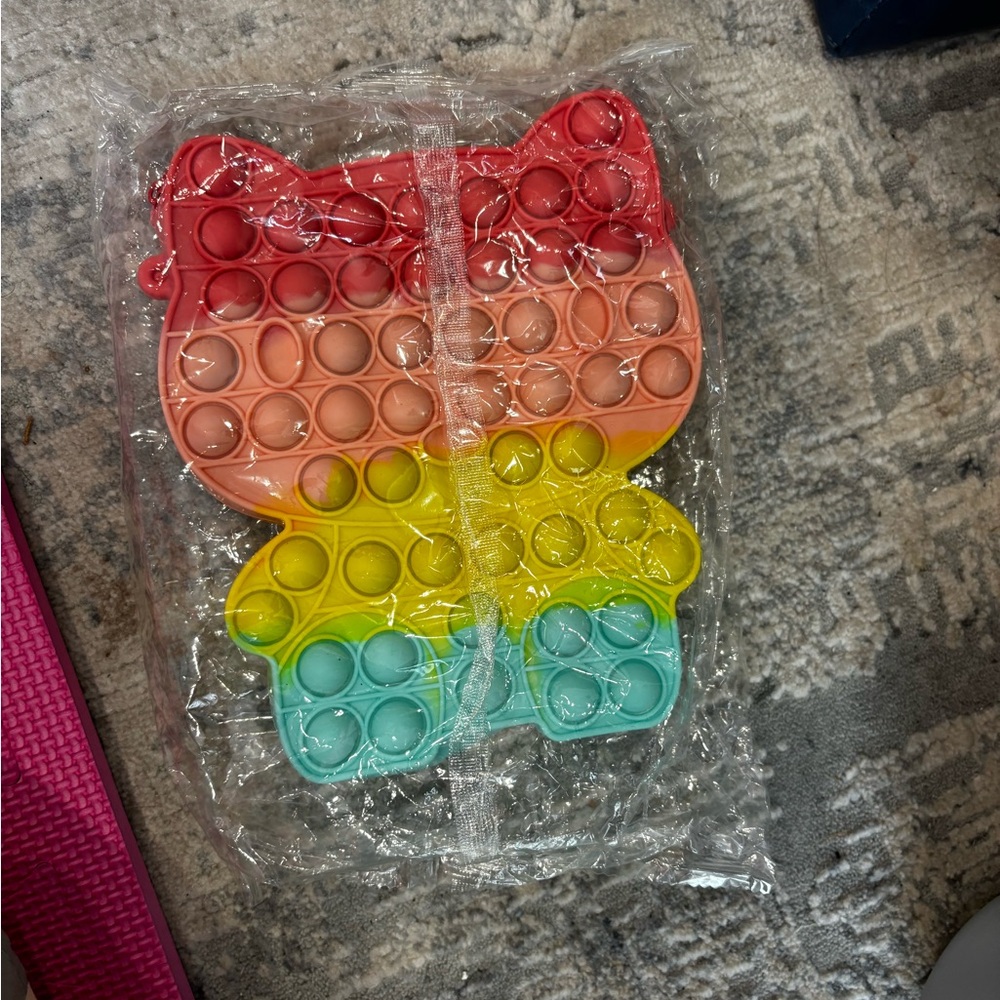 new in packaging kitty pop it purse